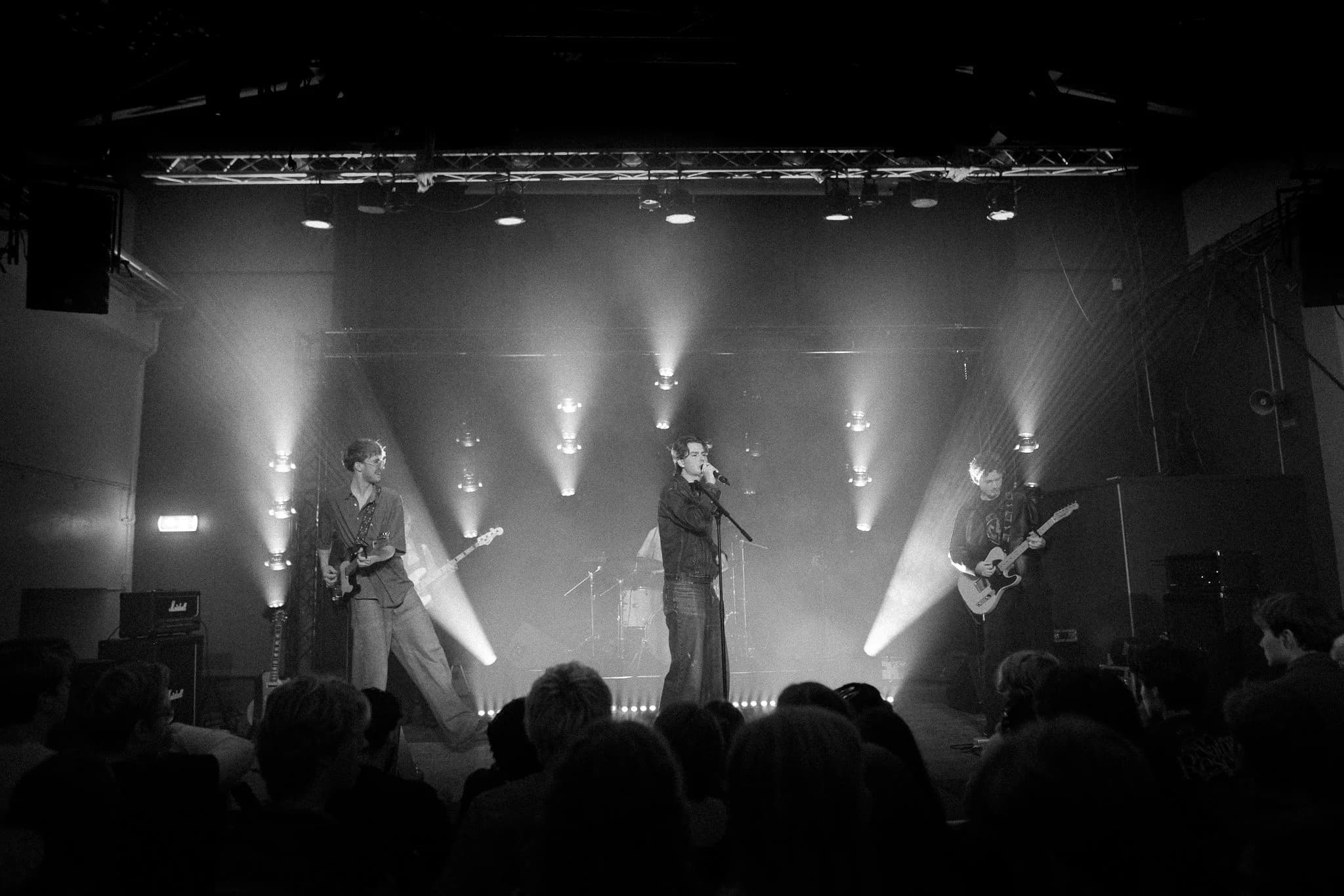 The Black Flakes rock band performing live on stage in Stockholm, Sweden